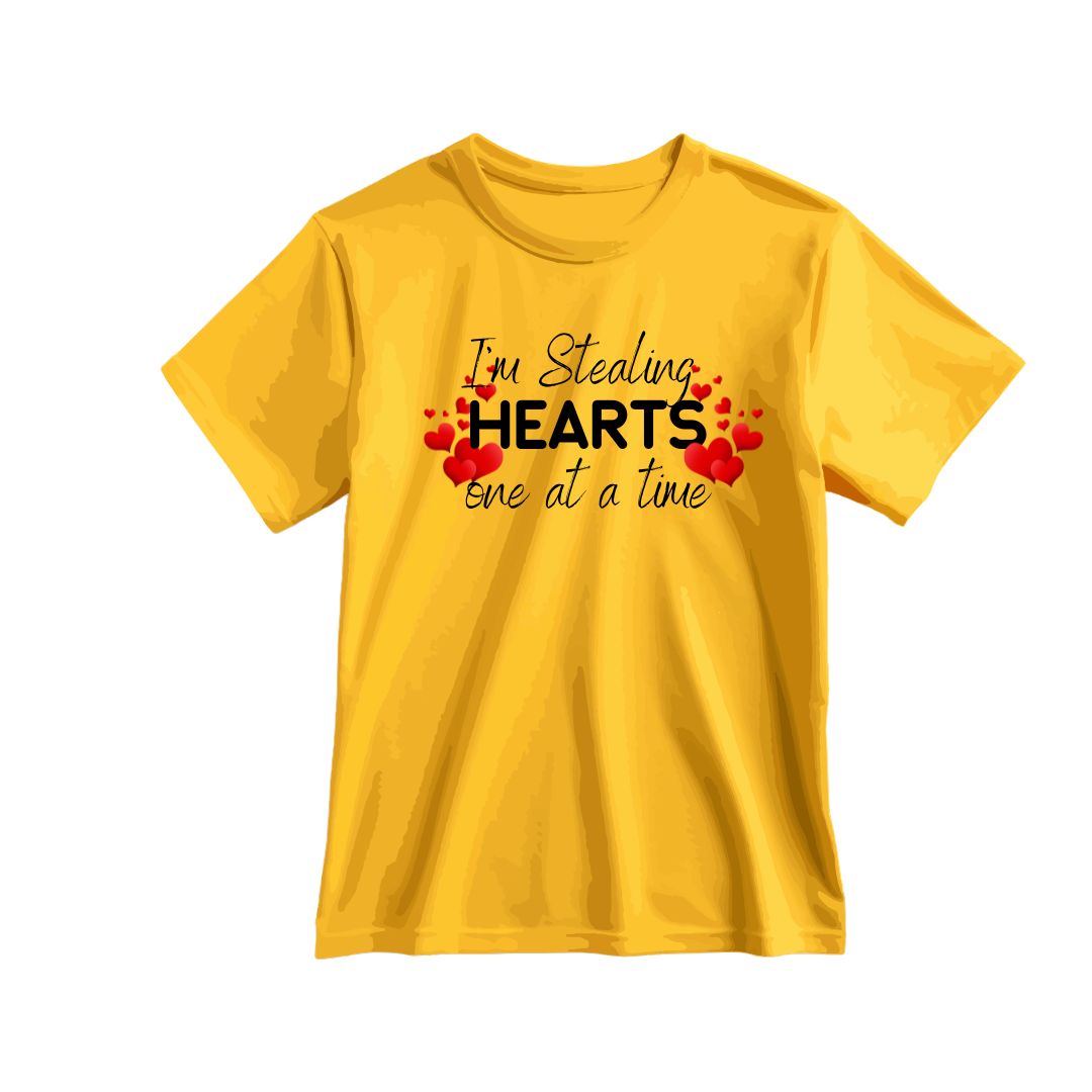 Yellow t-shirt with text 'I'm Stealing Hearts one at a time' on a white background